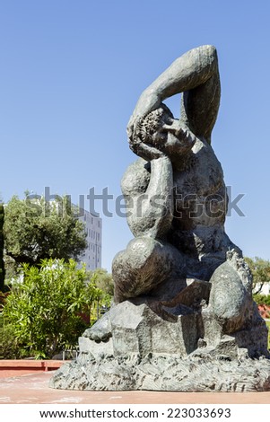 NICE, FRANCE - MAY 13, 2014: Massive sculpture made by born in 1946 Italian artist Sandro Chia, set in the gardens of Museum of Modern and Contemporary Art, title of the sculpture: Europe and the Sea