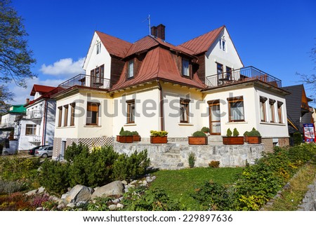 ZAKOPANE, POLAND - OCTOBER 14, 2014: Holiday House called Skalnica, formerly Mirabella, building of 1929, the regional style of architecture, offers 10 guestrooms