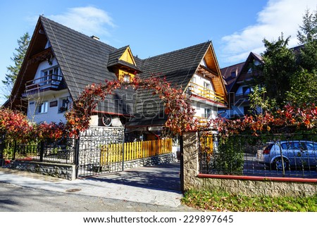ZAKOPANE, POLAND - OCTOBER 14, 2014: Contemporary villa named Orzel ( The Eagle ), built in the style of the region, offers holiday stays for guests arriving to the city throughout the whole year