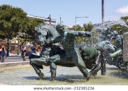 NICE, FRANCE - MAY 18, 2014: Mars, one of five statues that surround Apollo at Fountain of the Sun, unveiled in 1956, located on the south side of Place Massena