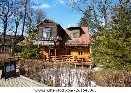 ZAKOPANE, POLAND - MARCH 10, 2015: Villa made of wood built in the fourth quarter of the 19th century, listed in the municipal register of architectural heritage, nowadays grill and bar named Czikago