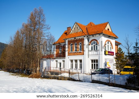 ZAKOPANE, POLAND - MARCH 09, 2015: Villa Made of brick, built for Dr. Rozycki, design by E. Wesolowski in 1913, listed in the municipal register of architectural heritage, nowadays Alior Bank branch