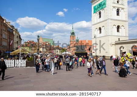 WARSAW, POLAND - MAY 03, 2015: Unidentified tourists and residents arrived the square to have a good time. Castle Square laid out in the years 1818-1821 nowadays the place where many events are held