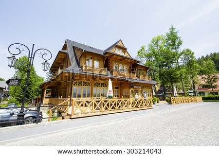 ZAKOPANE, POLAND - JUNE 09, 2015: Konstantynowka, wooden villa built in 1900 by the project of Stanislaw Witkiewicz, in this recently renovated, historic building, nowadays operates restaurant