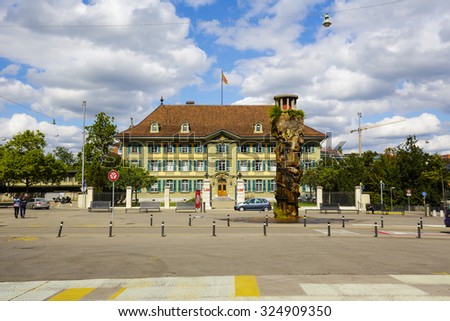 BERN, SWITZERLAND - SEPTEMBER 06, 2015: The Oppenheim fountain, it was set into operation in 1983, the fountain is situated on Waisenhausplatz in front of the cantonal police headquarters in Bern