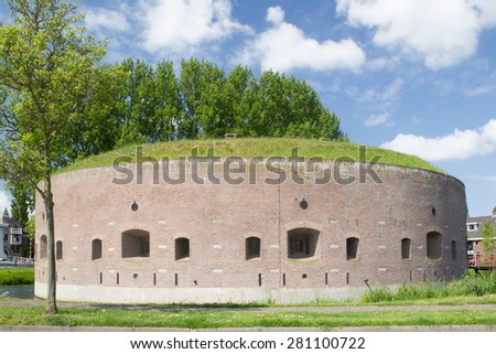 Weesp, Netherlands - May 21, 2015: Fort on the Ossenmarkt: old fortress tower is heart of the fortress Weesp, Netherlands