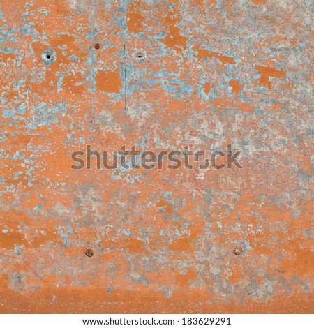 Old scratched texture of rusty metal with paint, background for design