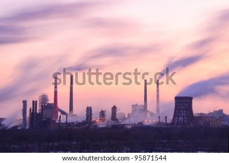 Chemical factory in the evening, with lights and smoke, long exposure