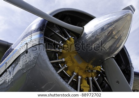 A side view of airplane cowl and an engine with propeller/Airplane Engine and propeller/pitt meadows canada 2011