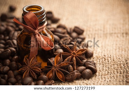 Bottle coffee aroma oil with coffee beans. aromatherapy