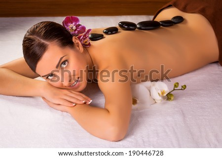 beautiful brunette in a massage parlor. spa