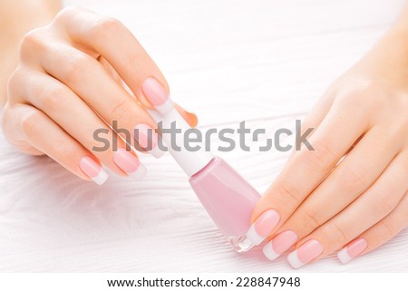 beautiful french manicure on white