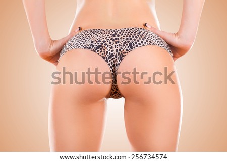 Beautiful body of woman exposing bottom. isolated