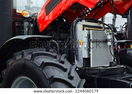 Similar – Image, Stock Photo Farmer repairing detail of agricultural machine