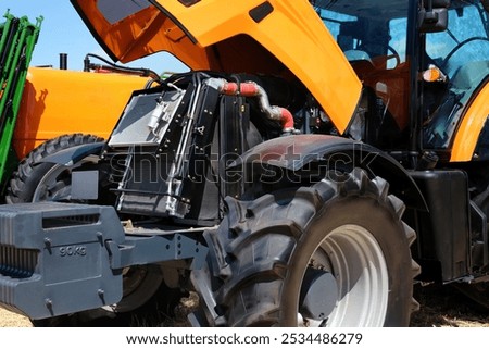Similar – Image, Stock Photo Farmer repairing detail of agricultural machine