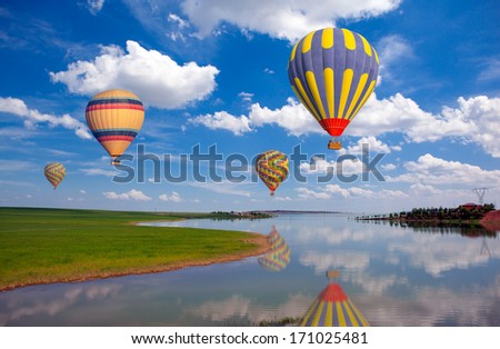 beautiful landscape and hot air balloon