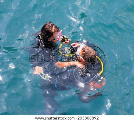 ALANYA  - TURKEY, JULY 08: Student scuba divers in the water during a rescue dive course July 08, 2014 in Alanya, Turkey