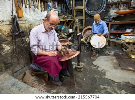 URFA - TURKEY - SEPTEMBER 06:Copper master, Hands detail of craftsman at work on September 06, 2014 in Urfa Turkey.