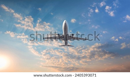 Image, Stock Photo Airplane flying over runway in countryside