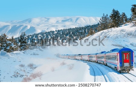 Similar – Foto Bild Ein schneeweisser ICE Zug mit einem dicken roten Streifen verlässt gerade München Hauptbahnhof. In seinen Fenstern spiegelt sich die Bahnhofshalle mit Neonleuchten, das graue Pflaster des Bahnsteigs zeigt einen weißen Streifen