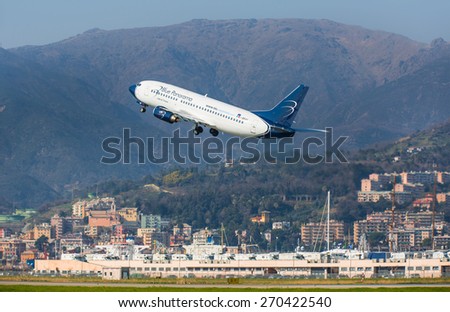 GENOA, ITALY - MARCH 18, 2015:  Blue Panorama airplane takes off from Genoa Airport