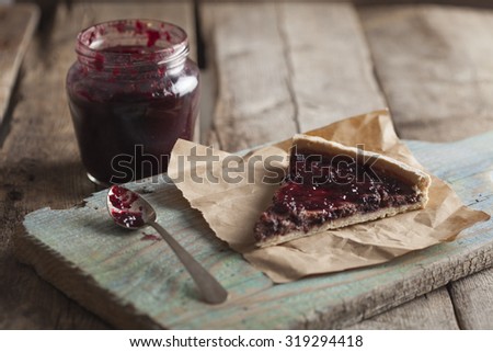 Blackberry pie on a wooden background