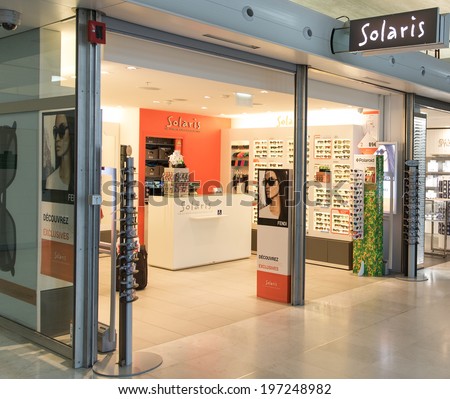PARIS, FRANCE - MAY 27, 2014: A Solaris sunglasses outlet. Set up in 1994, it belongs to the GrandVision Group and has expanded its network to reach 400 points of sale in 2013.