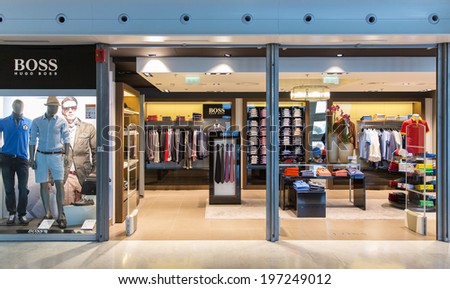 PARIS, FRANCE - MAY 27, 2014: A HUGO BOSS store. Based in Metzingen in Germany it has 12,000 staff, 840 own stores and 2012 sales of EUR 2.3 billion in 129 countries.