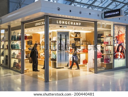 PARIS, FRANCE - MAY 27, 2014: A Lonchamp store. Longchamp is distributed in 100 countries through 1,800 retail stores and had revenue of 454 million Euros in 2012.