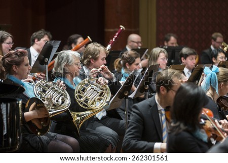 GENEVA, SWITZERLAND MARCH 1, 2015: Musicians playing in the United Nations Orchestra at a concert at the Victoria Hall commemorating 200 years of Geneva in the Swiss Confederation.