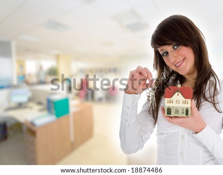 Business woman advertises real estate on  background