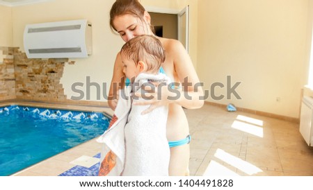 Similar – Image, Stock Photo Woman wiping calm big dog in bathroom after washing