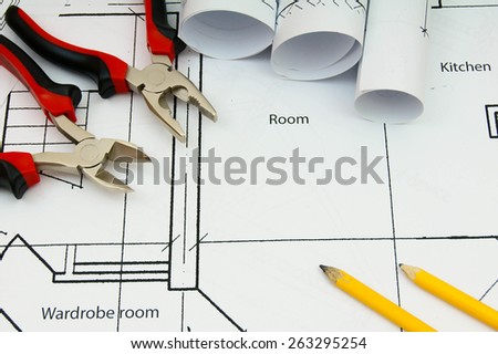 Planning of construction of the house. Drawings for building house and working tools.