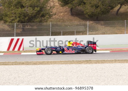 BARCELONA - MARCH 3: Mark Webber of Red Bull Racing  F1 team racing during Formula One Teams Test Days at Catalunya circuit on March 3, 2012 in Barcelona, Spain.