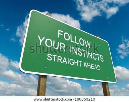 Road sign to follow your instincts