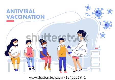 Children vaccination concept for immunity health. Covid-19.
Doctor pediatrician makes an injection of flu vaccine to a kid in hospital.  Healthcare, coronavirus, prevention and immunize.