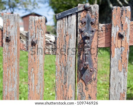 old fence with a lock
