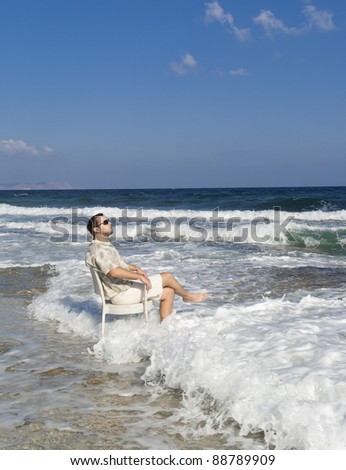 Happy man enjoying good day near Mediterranean sea