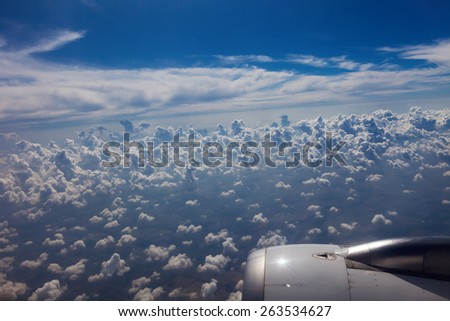 beautiful view from the window of the plane in flight in clear day