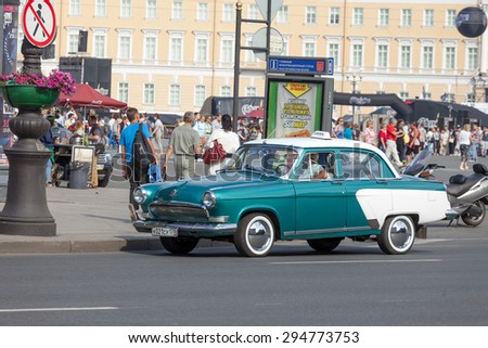ST.PETERSBURG,RUSSIA-JULY 04:The ancient car of a taxi costs on Nevsky Avenue, RUSSIA-JULY 04 2015.In St. Petersburg many retrocars are used as a taxi.