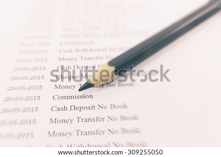 Close up document of bank statement with pencil on zoom effect : Can use for financial background.