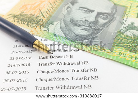 Bank statement paper with money and pen : Can used for financial concept.