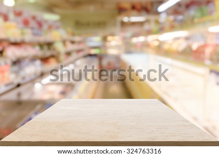 Blank wood table top or shelf with crytral effect supermarket or warehouse : Suitable use for montage or display your products.