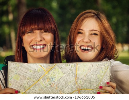 Two Tourist Girls In Nature Browse Map