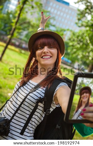Young Tourist Girl Taking Selfie Using Digital Tablet
