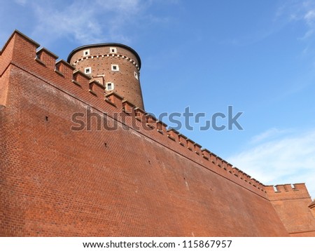 Fragment of walls of Wawel Castle, Krakow, Cracow. Poland. Red brick, gothic, defensive wall fortification.