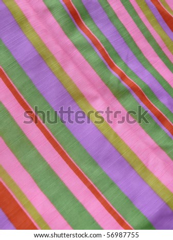 colorful 80s style stripy cotton textile close up. More of this motif & more textiles in my port.