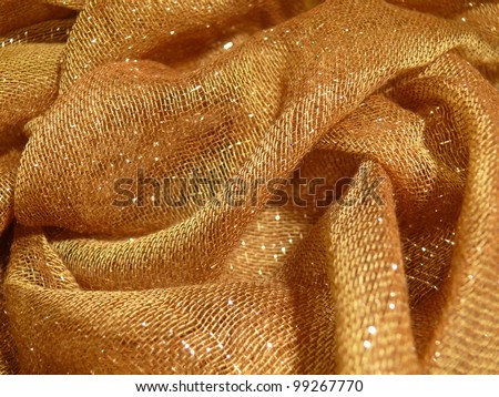 Beautiful, subtle, golden, fashionable oriental scarf textile texture. Good for fashion, oriental, apparel, abstract, conceptual designs.
