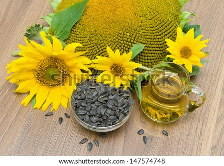 flowers sunflower, seeds and sunflower oil close-up. horizontal photo.