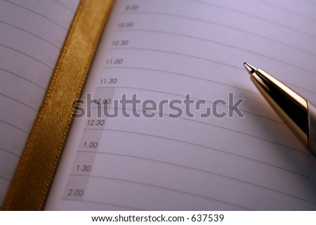pen on diary that is marked